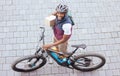 Black man, delivery bike and street portrait from top view for logistics, cargo and happy for job. Young african person Royalty Free Stock Photo