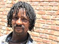 Black man with dreadlocks