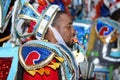 A black man dressed in a colorful costume at Junkanoo