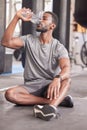 Black man drink water, fitness and gym with challenge workout training for muscle and thirsty with motivation, goals and