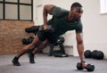 Black man, dumbbell row and training in gym, workout and strong fitness in health club. Serious sports athlete Royalty Free Stock Photo