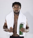 Black man, exercise and portrait with towel and water bottle for sports training in studio. Health and wellness of a Royalty Free Stock Photo