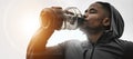 Black man, fitness and drinking water on break for hydration, workout or exercise in motivation. Banner of African male Royalty Free Stock Photo