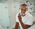 Black man, foam and happy for shaving, grooming and cosmetics in mirror for self care in home. Young african guy, soap Royalty Free Stock Photo