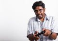 Black man funny use hand playing video game pad joystick Royalty Free Stock Photo