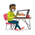 A black man graphic designer works at the office desk. Royalty Free Stock Photo