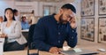 Black man, headache and stress in office, deadline and laptop for work, mental health and upset. Employee, overworked Royalty Free Stock Photo