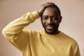 Black man looking at camera in studio Royalty Free Stock Photo