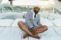 A black man on a luxury yacht Royalty Free Stock Photo