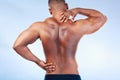 Black man, neck pain and back injury with fitness and health, medical problem and aching body in studio. Emergency Royalty Free Stock Photo