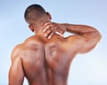 Black man, neck pain and injury with fitness and health, medical problem and aching body with back view. Emergency Royalty Free Stock Photo