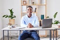 Black man, office and portrait of a accounting manager at a desk ready for work on African business. Happy, accountant