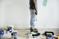 Black man painting house wall Royalty Free Stock Photo