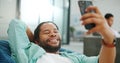 Black man, phone and peace sign on video call with smile for social, networking or communication at the office. African Royalty Free Stock Photo