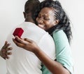 Black man proposes to his girlfriend Royalty Free Stock Photo