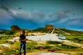 Black man standing in front of ruined building from the Frig tim Royalty Free Stock Photo