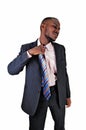 Black man taking off tie. Royalty Free Stock Photo