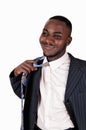 Black man taking off tie. Royalty Free Stock Photo