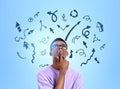 Black man thinking, arrows with different direction, difficult choice Royalty Free Stock Photo