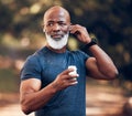 Black man, wireless earphones and running outdoor in park, nature or garden for healthy workout. Senior sports male