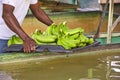 Black man worker preparing to pack bananas in a factory