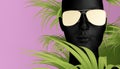 Black mannequin head in golden glasses, with palm leaves on a pink background. The concept of fashion, style, beauty. Pop art.