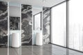 Black marble bathroom corner, double sink Royalty Free Stock Photo