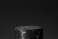 Black marble showcase product background stand or podium pedestal on dark display with luxury backdrops. 3D rendering