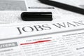 Black marker on newspaper. Job search Royalty Free Stock Photo