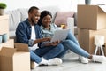 Black Married Couple Shopping Online With Laptop And Credit Card After Moving Royalty Free Stock Photo