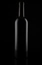 Black matt glass wine bottle, isolated on black