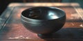 Black Matte Ceramic Bowl on Wooden Table Royalty Free Stock Photo