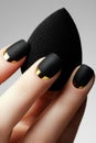 Black matte nail polish. Manicured nail with black matte nail p Royalty Free Stock Photo