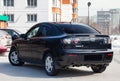 Black Mazda 3 2008 year rear view with dark gray interior in excellent condition in a parking space among other cars