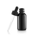 Black Medical container for nasal eye, Medical drops, bottle with dropper isolated on white background Royalty Free Stock Photo