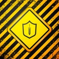 Black Medieval shield with sword icon isolated on yellow background. Warning sign. Vector