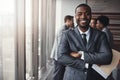 Black man in business, arms crossed with smile in portrait and leadership, corporate lawyer in meeting. Businessman in Royalty Free Stock Photo