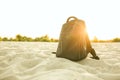 Black men `n packpack standing on a sand at the beach. Copy space Royalty Free Stock Photo