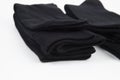 Black men`s socks made of cotton on a white background