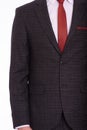 Black men`s suit and white shirt and red tie, close up Royalty Free Stock Photo