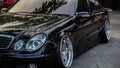 Black Mercedes Benz E320 W211 sedan