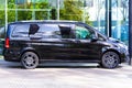 Black Mercedes-Benz V class, side view minivan in a parking lot. Russia, Saint-Petersburg. 14 may 2020