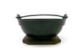 Black metal handle bowl with wooden tray Royalty Free Stock Photo