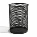 Black Metal Mesh Wastebasket with Diamond Pattern on White Background trash can garbage Royalty Free Stock Photo