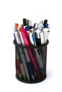 Black metal pen holder with pens and pencils Royalty Free Stock Photo