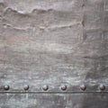 Black metal plate or armour texture with rivets Royalty Free Stock Photo