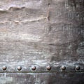 Black metal plate or armour texture with rivets Royalty Free Stock Photo