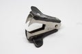 A black and metal staple remover closeup shoot with good lightning