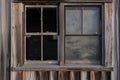 black metal window frame with weathered wood siding Royalty Free Stock Photo