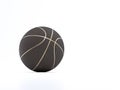 Black metalic Basketball close-up on bright studio background Royalty Free Stock Photo